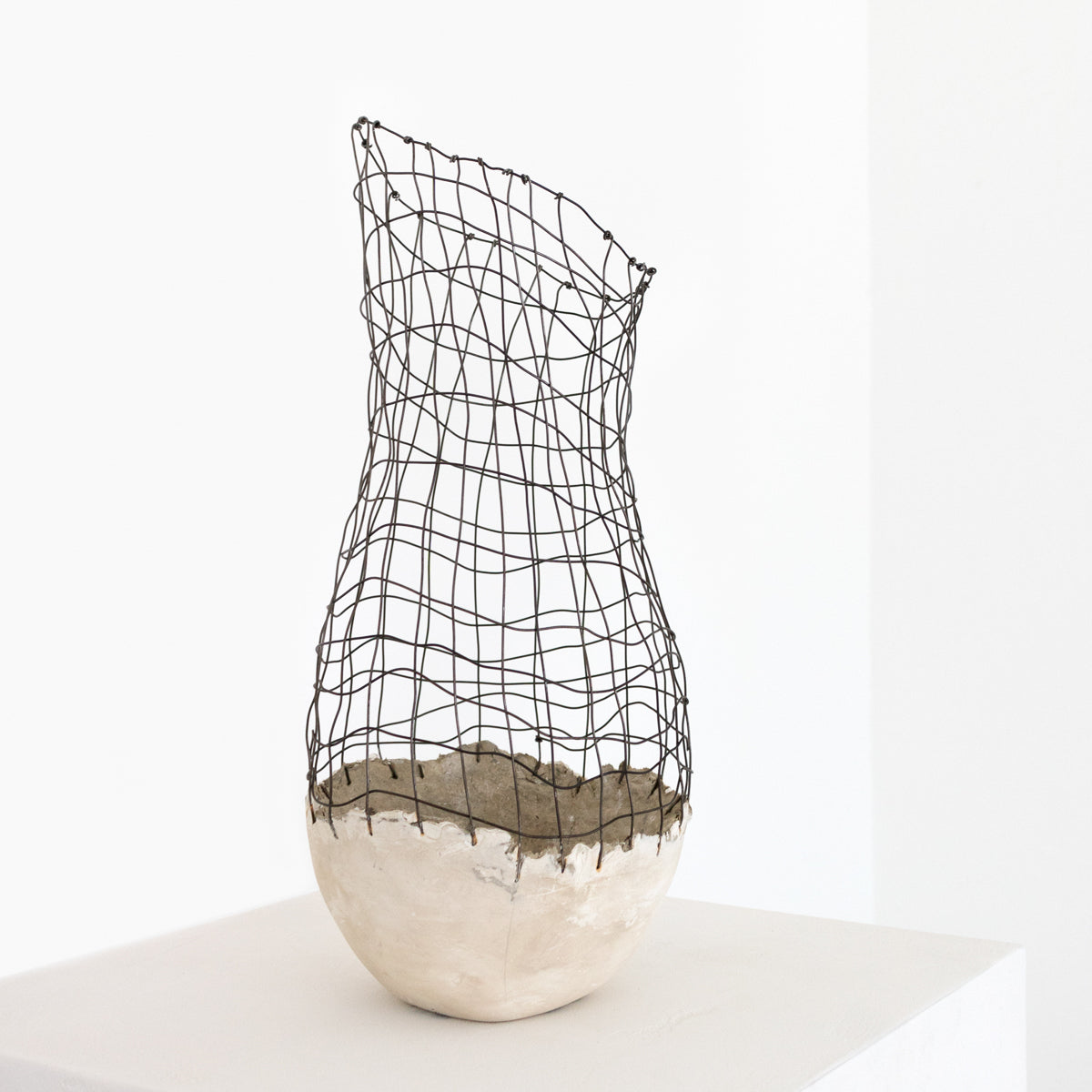 Handmade by artist Jennifer Alden Design, Vessel Study No. 40 is a contemporary sculpture made from paper clay, plaster, paint and wire. Each vessel in this collection is one-of-a-kind, rare, and both primitive and modern.