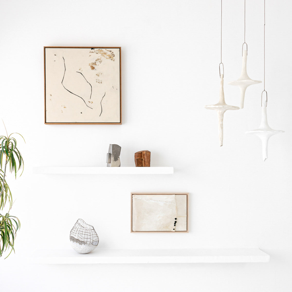 These representational fungi are handmade from paper clay, plaster, paint and wire. Jennifer Alden Design one-of-a-kind contemporary hanging sculpture.