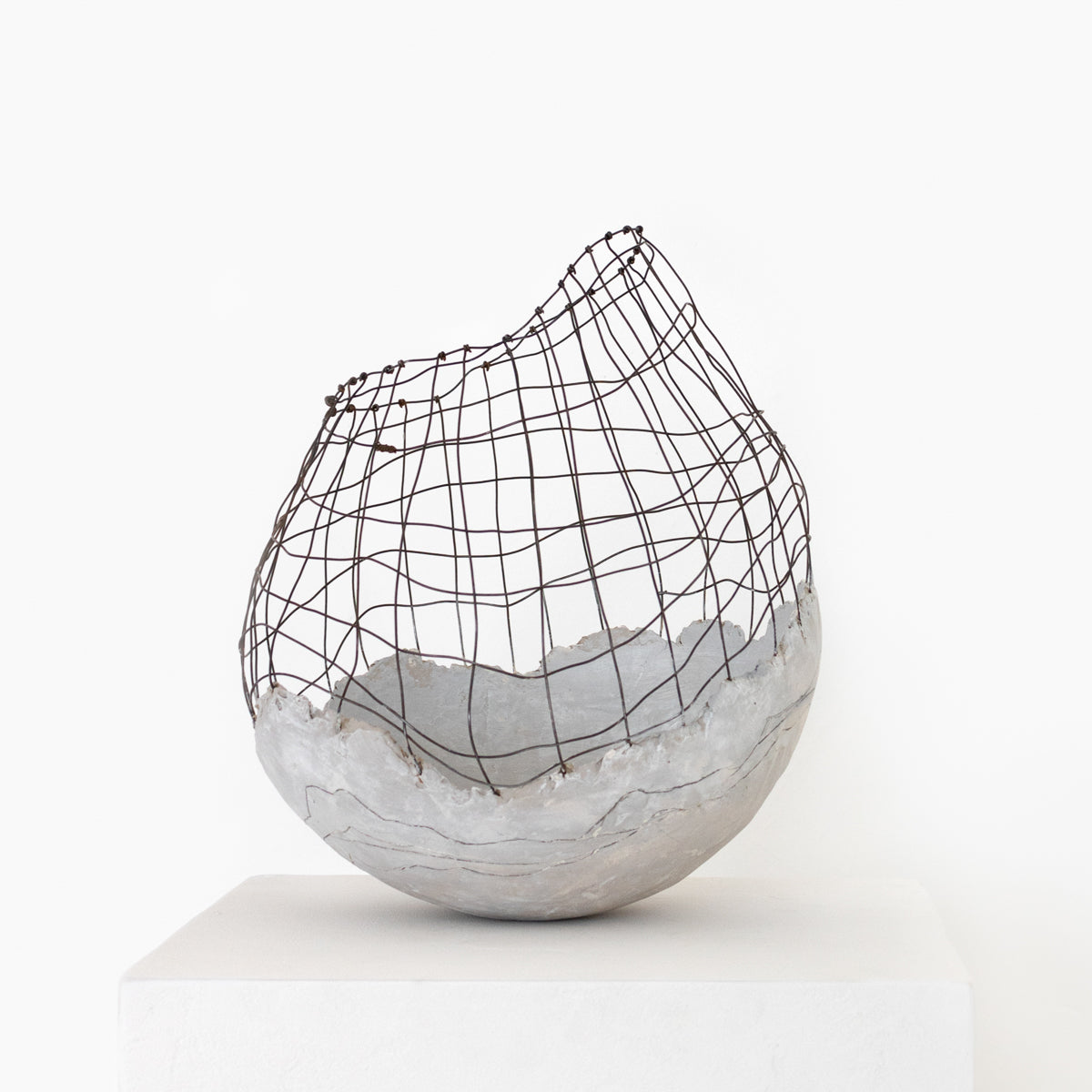 Handmade by artist Jennifer Alden, Vessel Study No. 35 is a contemporary sculpture made from paper clay, plaster, paint and wire. Each unique vessel in this collection is one-of-a-kind, rare, and both primitive and modern. 