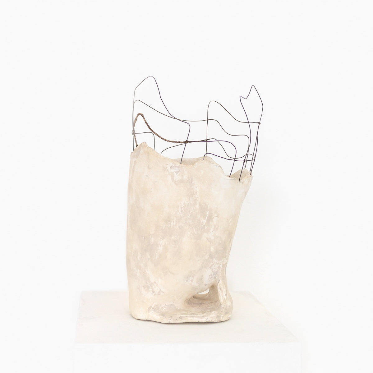 Handmade by artist Jennifer Alden Design, Vessel Study No. 44 is a contemporary sculpture made from paper clay, plaster, paint and wire. This sculpture is designed for tabletop or floor placement. Each unique vessel in this collection is one-of-a-kind, rare, and both primitive and modern. 